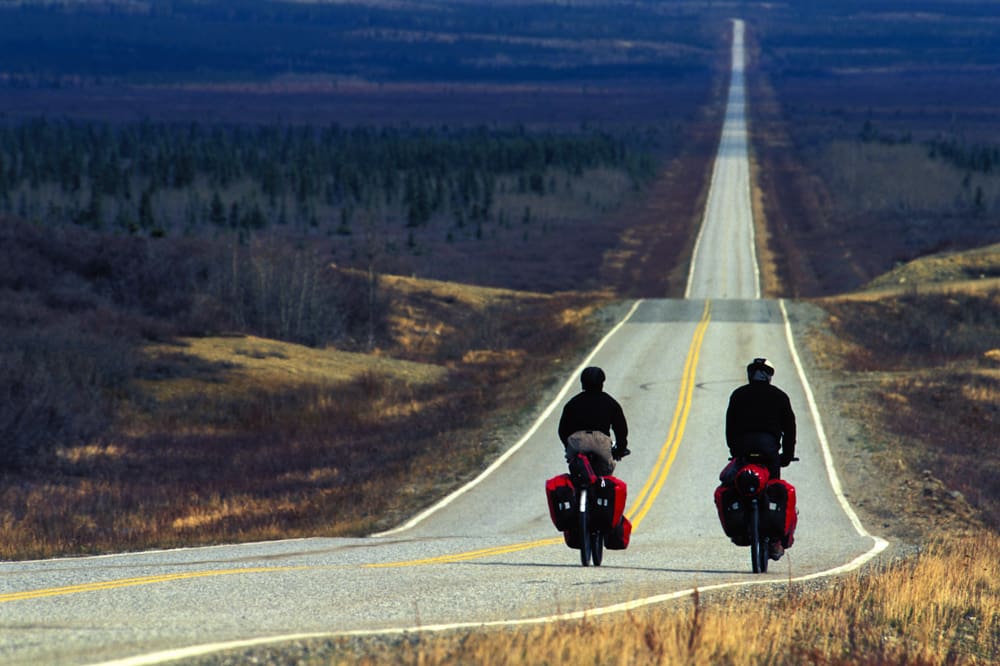 ONLY 1200 MILES TO GO. JOHN GREENGO (LEFT) WITH HIS ADVENTURE BUDDY, TIM (RIGHT)