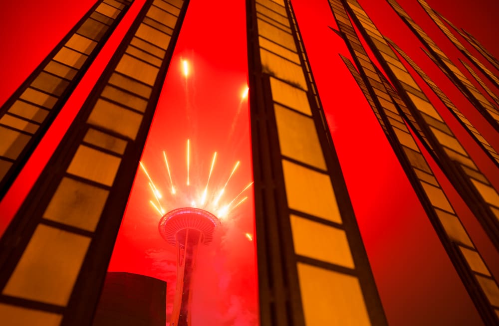 Seattle Space Needle on New Year's Eve with fireworks