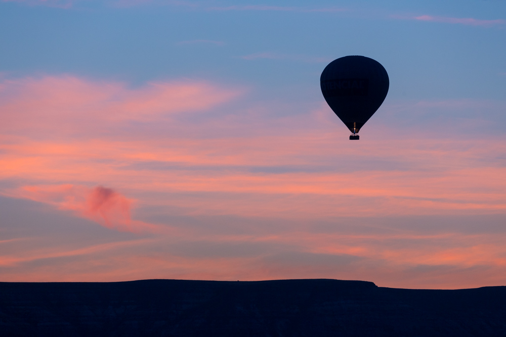 A hot air balloon at sunrise
