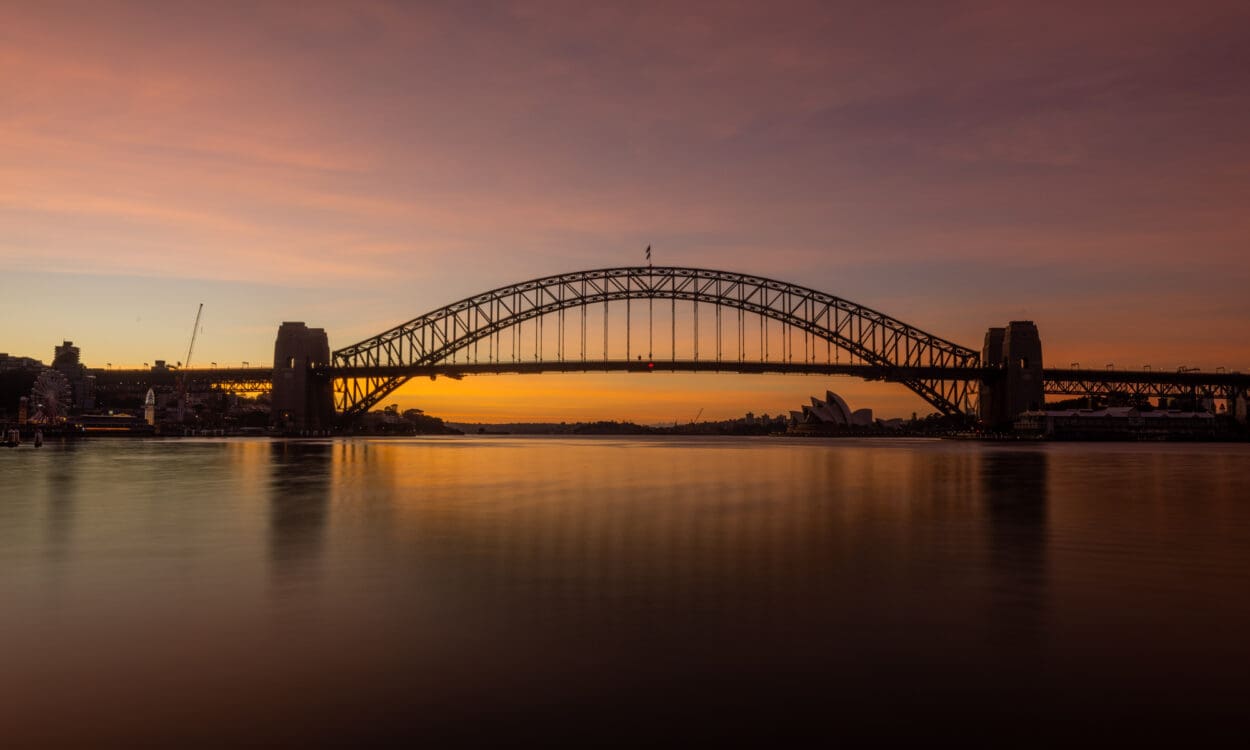 Sydney Harbour Bridge at dusk.