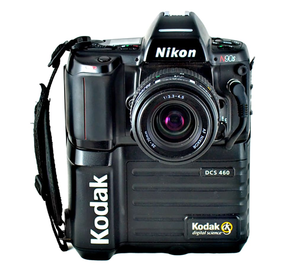 Kodak DCS 460 digital camera back attached beneath a Nikon N90s film camera body.